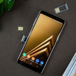 Samsung Galaxy A8 (2018) showing its card slots.