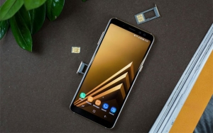 Samsung Galaxy A8 (2018) showing its card slots.