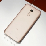 The Xiaomi Redmi 5 Plus smartphone in gold.