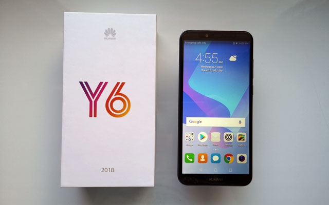 The Huawei Y6 2018 smartphone and its simple box.