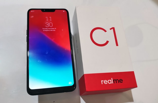 The Realme C1 smartphone and its simplistic box.