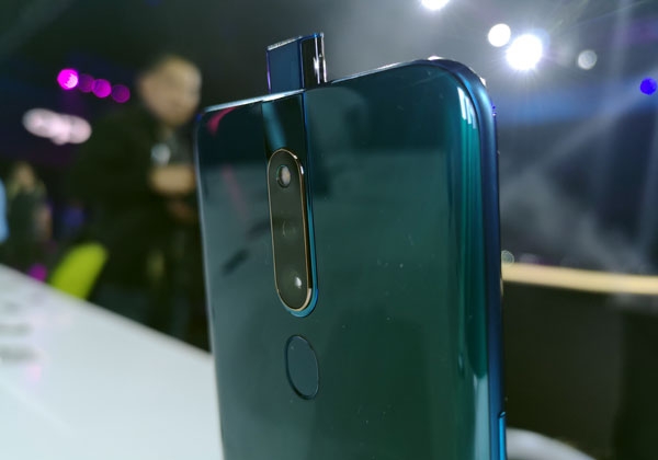 The OPPO F11 Pro's dual rear camera and rising front camera.