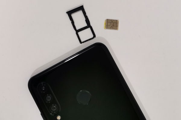 The Huawei P30 Lite SIM card tray.