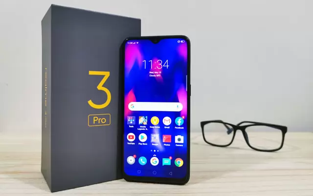 The Realme 3 Pro smartphone and its box.