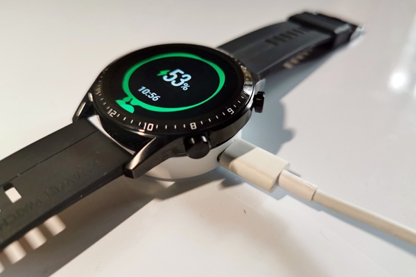 Huawei Watch GT 2 on its charging cradle.