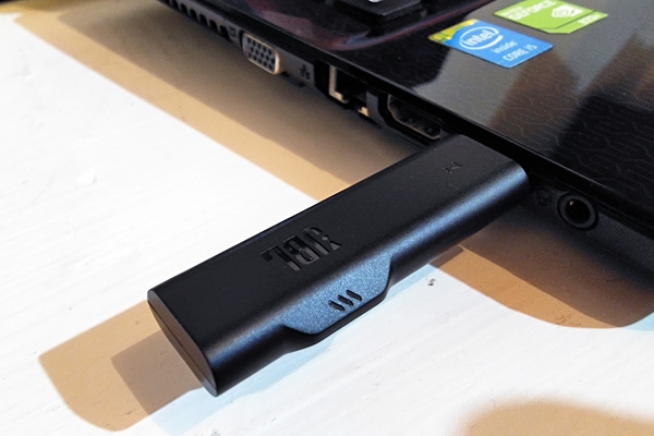 The JBL Quantum 600 Wi-Fi dongle.