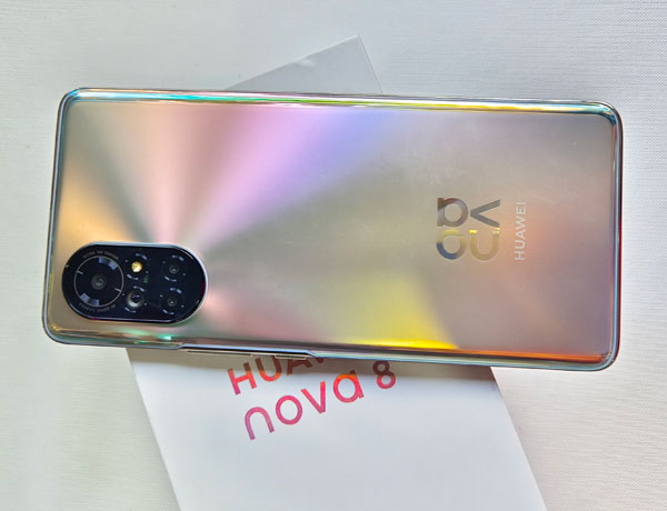 The Huawei nova 8 and its box.