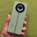 The realme 11 Pro+ 5G smartphone in Oasis Green color.